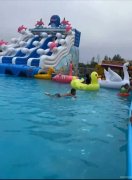 C8841位于昌吉屯河畔花田林海露营区儿童游泳池带滑梯转让