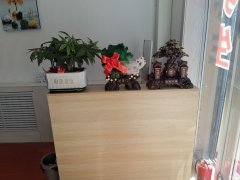 C11142昌吉市乌伊西路与滨河北路交叉口临街营业中养生馆转