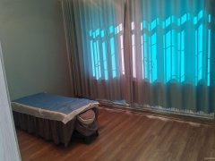 C11142昌吉市乌伊西路与滨河北路交叉口临街营业中养生馆转